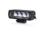 Angled view of the lamp face highlighting the depth of the housing and the contours of the lens and outer casing.